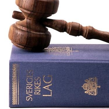 Lagbok med ordförandeklubba